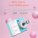 Draagbare digitale kindercamera 2,4 inch 1080p met dubbele camera, instant printfunctie en MP3-weergave, inclusief 3 rollen printpapier.
