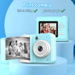 Draagbare digitale kindercamera 2,4 inch 1080p met dubbele camera, instant printfunctie en MP3-weergave, inclusief 3 rollen printpapier.