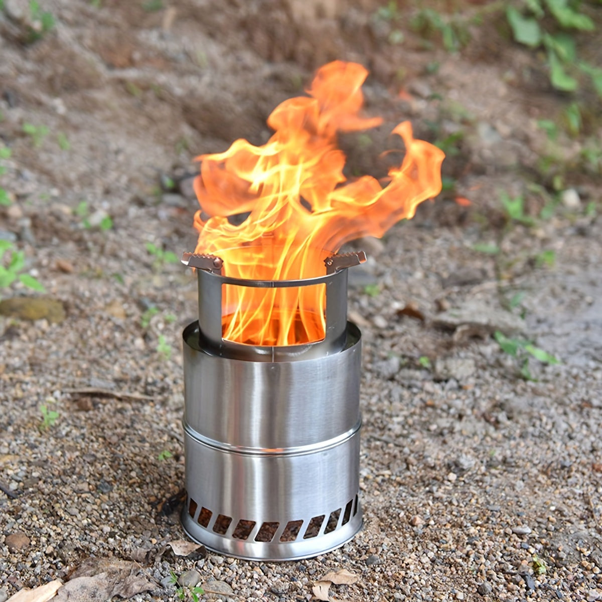 Met de draagbare ronde houtskoolkachel van roestvrij staal creëert u eenvoudig een mobiel houtskoolvuurfeest.