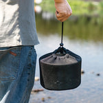 Met de draagbare ronde houtskoolkachel van roestvrij staal creëert u eenvoudig een mobiel houtskoolvuurfeest.